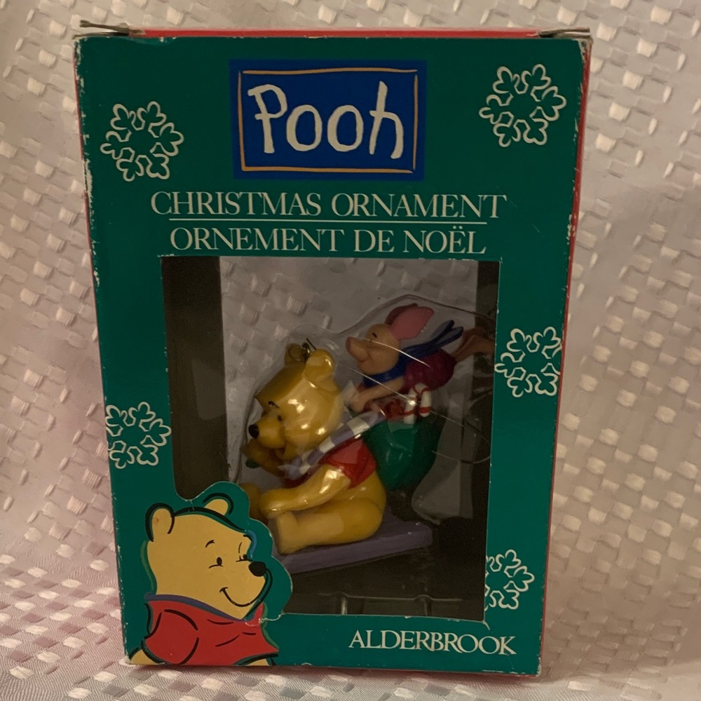 Winnie the Pooh holiday Ornament; Pooh and Piglet on a sled, 3 inches high.
